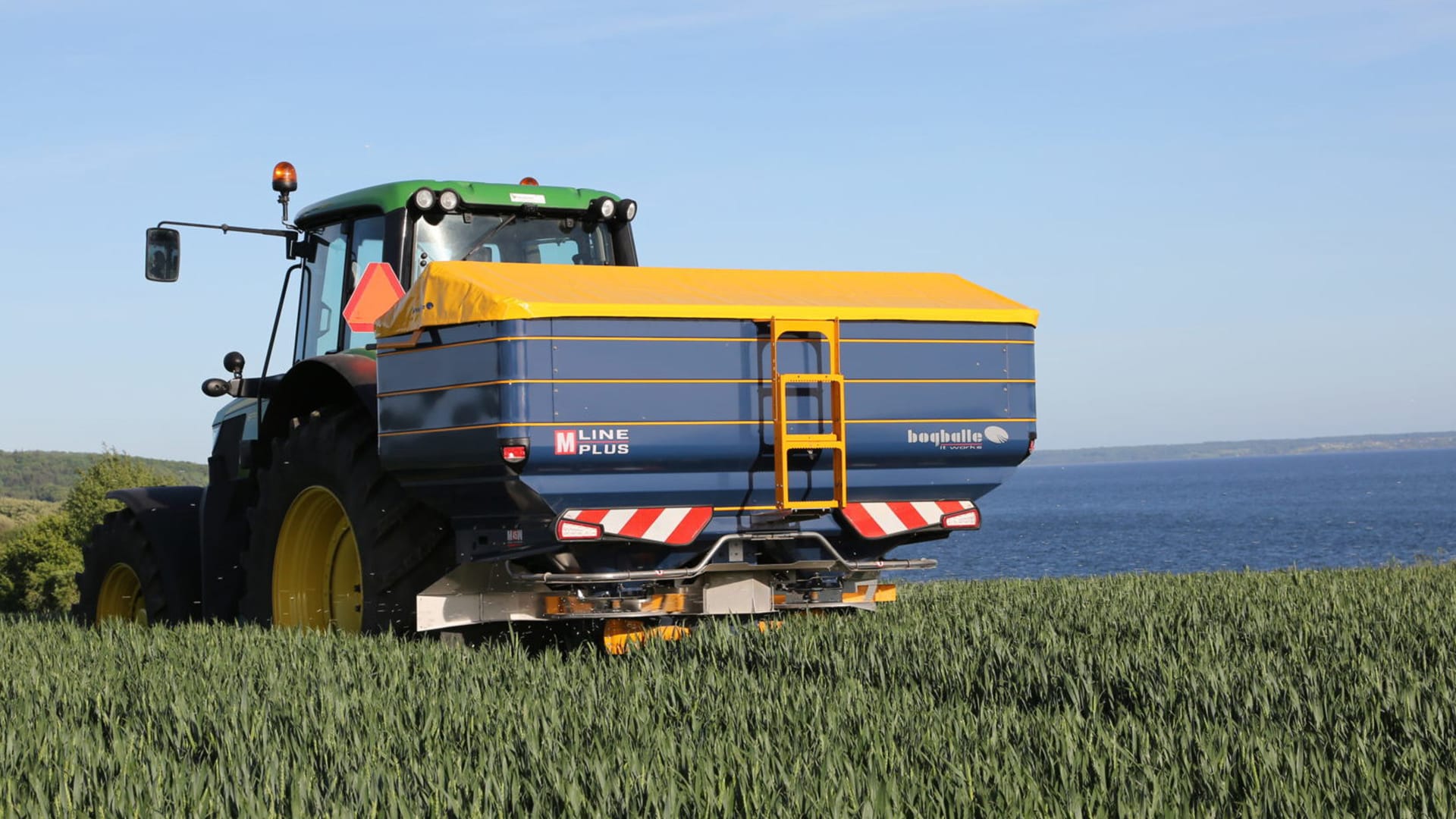 Tarp cover for spreader
